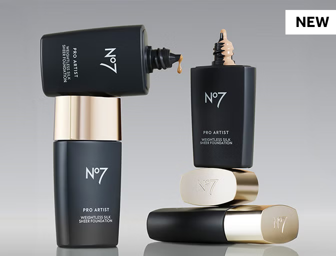 No7 Pro Artist Weightless Silk Foundation against a grey background. The products are stacked on top of each other with the foundation dripping across the products.
