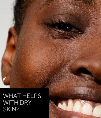 'WHAT HELPS WITH DRY SKIN?' text in white over black box. Image is close up model shot.