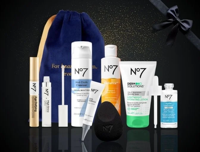Pictured: 8 No7 Beauty items: No7 Cleansing Hot Cloth Cleanser 200ml; No7 HydraLuminous+ Serum 30ml; No7 High Shine Lip Gloss Transparent; Flawless Finish Blending Sponge; No7 Early Defence Eye Cream 15ml; No7 Radiance+ Vitamin C Toner 200ml; No7 Derm Solutions Lightweight Hydrating Lotion 50ml; No7 Age Defying All-In-One Serum Mascara Black/Brown 7ml; No7 Blue Gift Pouch