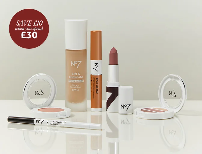 Image features No7 Stay Perfect Eye Pencil, Lift & Luminate Serum Foundation, No7 The Full 360 Mascara, No7 Lipstick No7 Eyeshadow Trios Antique on a white and beige-grey background. Image has a reflection. Text on the top reads 'Save £10 when you spend £30'.