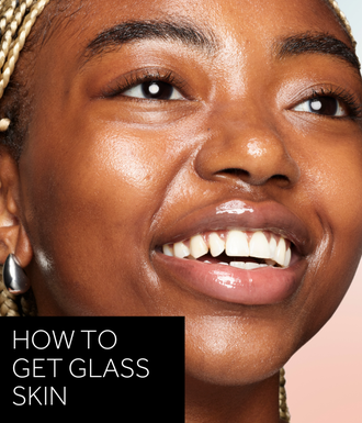'How to get glass skin' text in white over black box. Image is close up model shot showing the glass skin look.