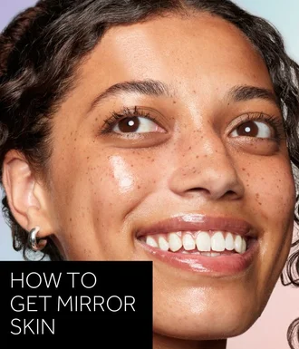 'How to get mirror skin' text in white over black box. Image is close up model shot showing the mirror skin look.